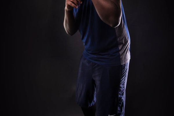 A person in a powerful, stable stance.